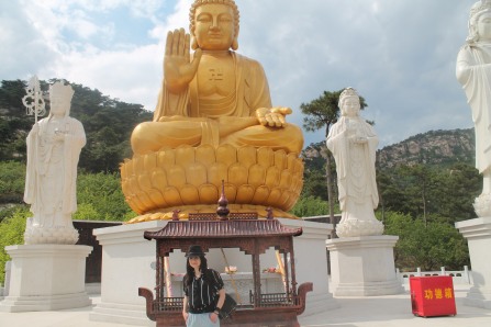 Look how tiny I am in front of the Buddha